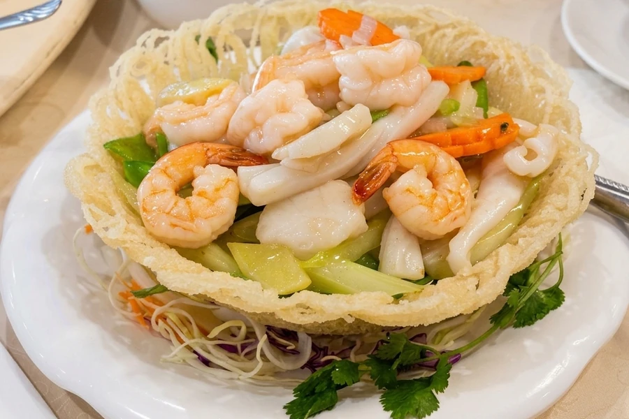Sauteed Seafood with Vegetable in a Potato Nest - Signature dish at Royal Taste Chinese Cuisine Calgary